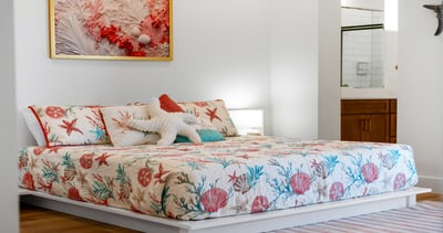 Soft, stylish comfort with a coastal touch Sink into this inviting bed with plush linens and beach-inspired décor—your perfect place to unwind after a day…