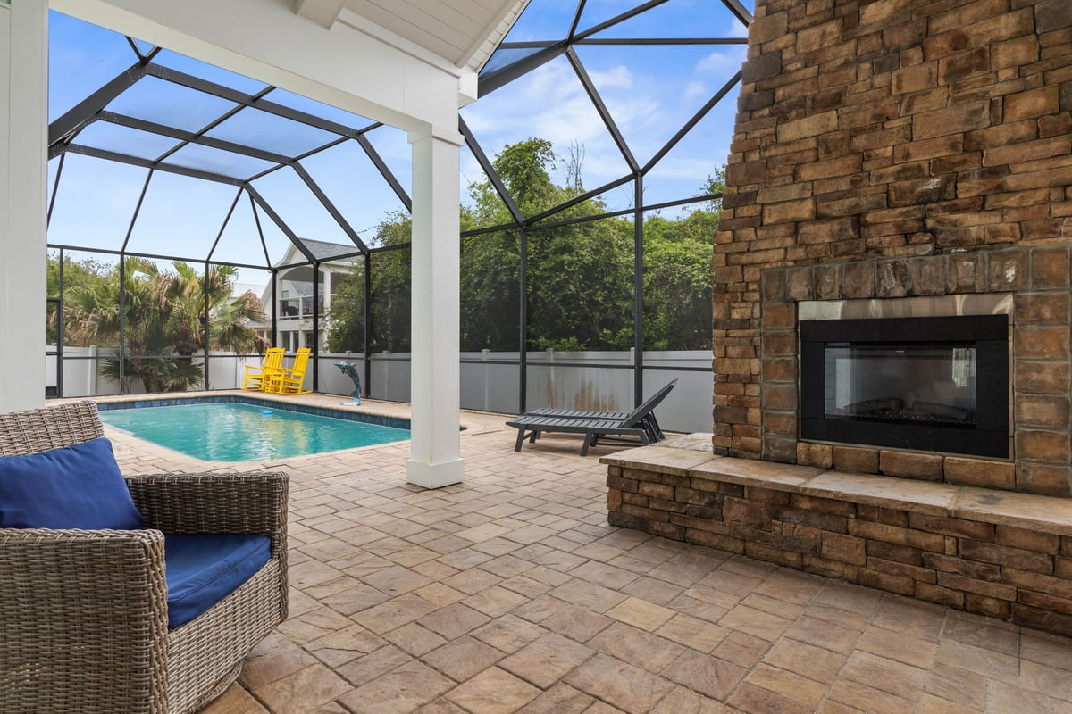 Start the morning with coffee by the outdoor fireplace, spend the afternoon splashing in your private pool, and end the night in the screened lanai making…