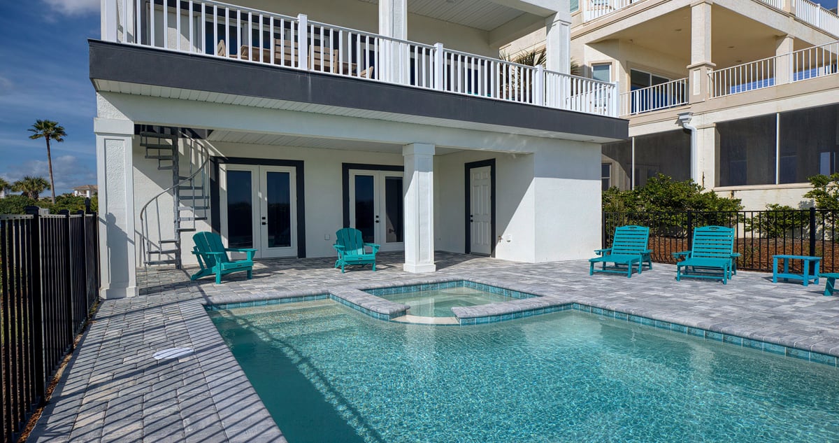 Private pool + spa steps from your back door Spacious paver deck with lounge chairs and shaded seating—perfect for sunny afternoons, evening soaks, and…