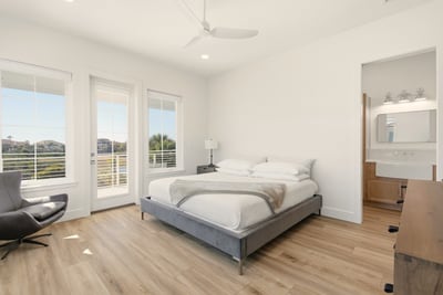 Wake to soft coastal light, slip open the balcony door, and let the morning ease in.
